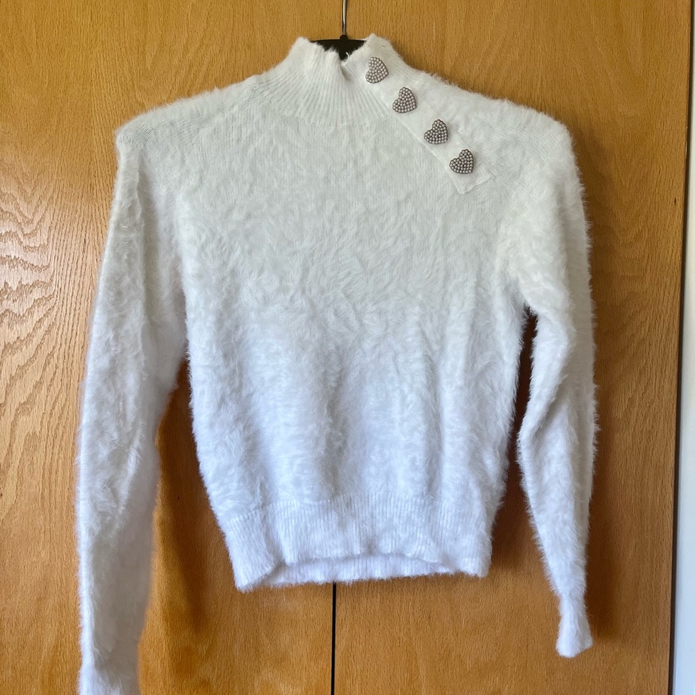 White turtleneck sweater